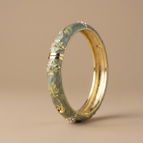 Sage green enamel floral vine gold bangle - vertical view