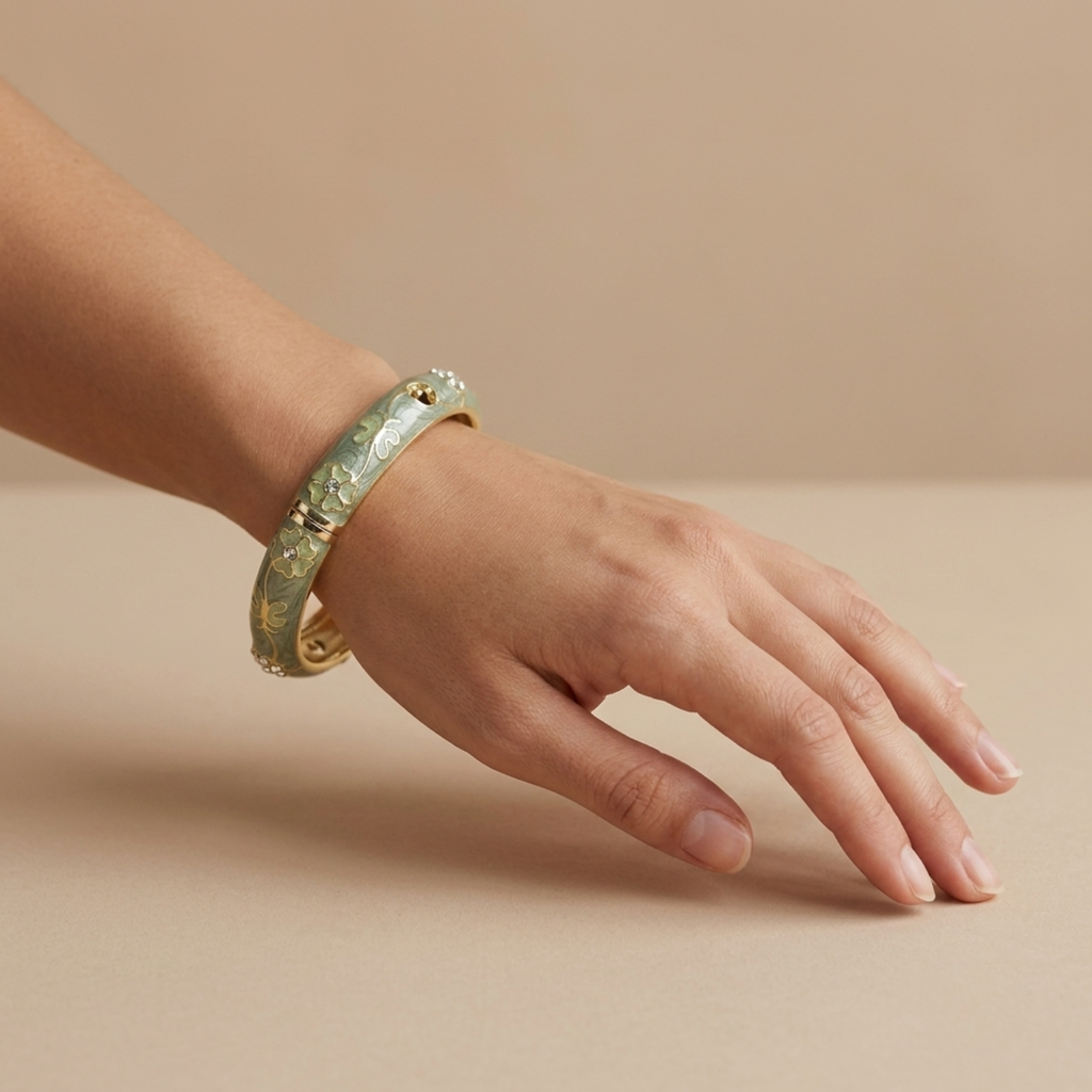 Sage green enamel floral vine gold bangle - close-up view