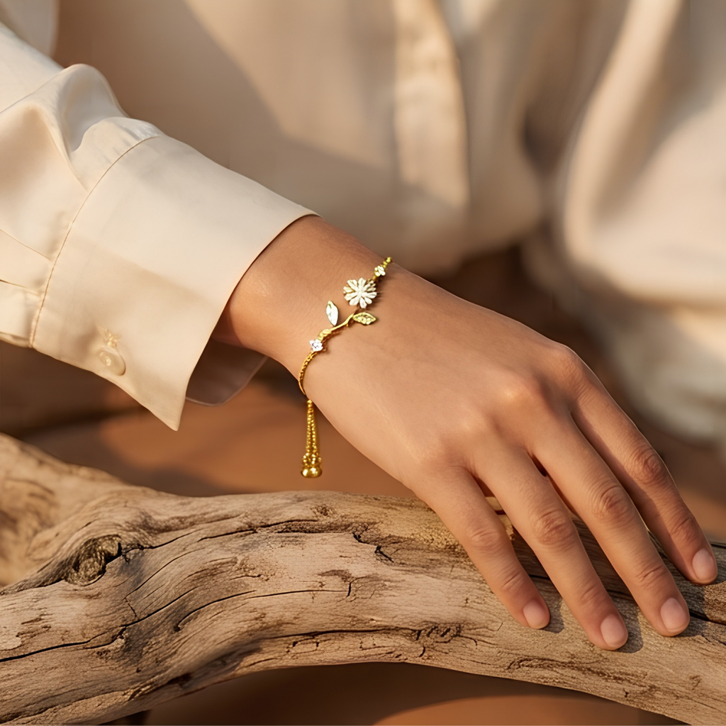 Elegant Floral Design Adjustable Gold-Plated Bracelet with Sparkling Cubic Zirconia Stones
